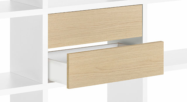 Two pull-out drawers with oak fronts built into a cube segment