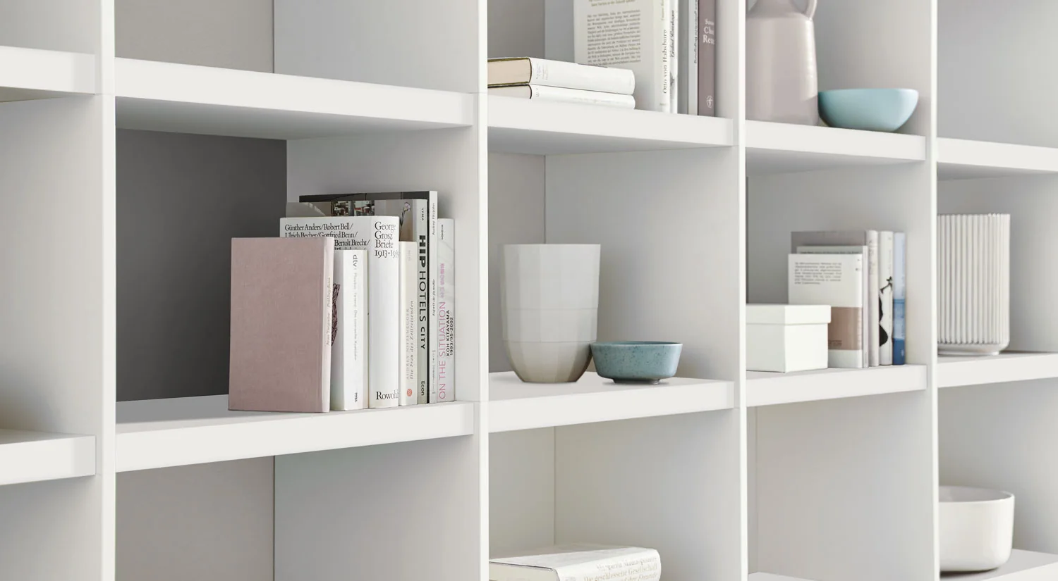 Book Storage YOMO - Book shelving units with white shelf boards and grey backboard detail